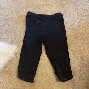 Black BCG Capri workout tights with cuffed bottoms